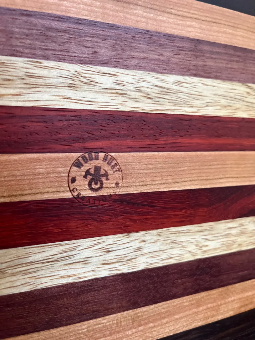 Edge grain cutting board made from mixed hardwoods